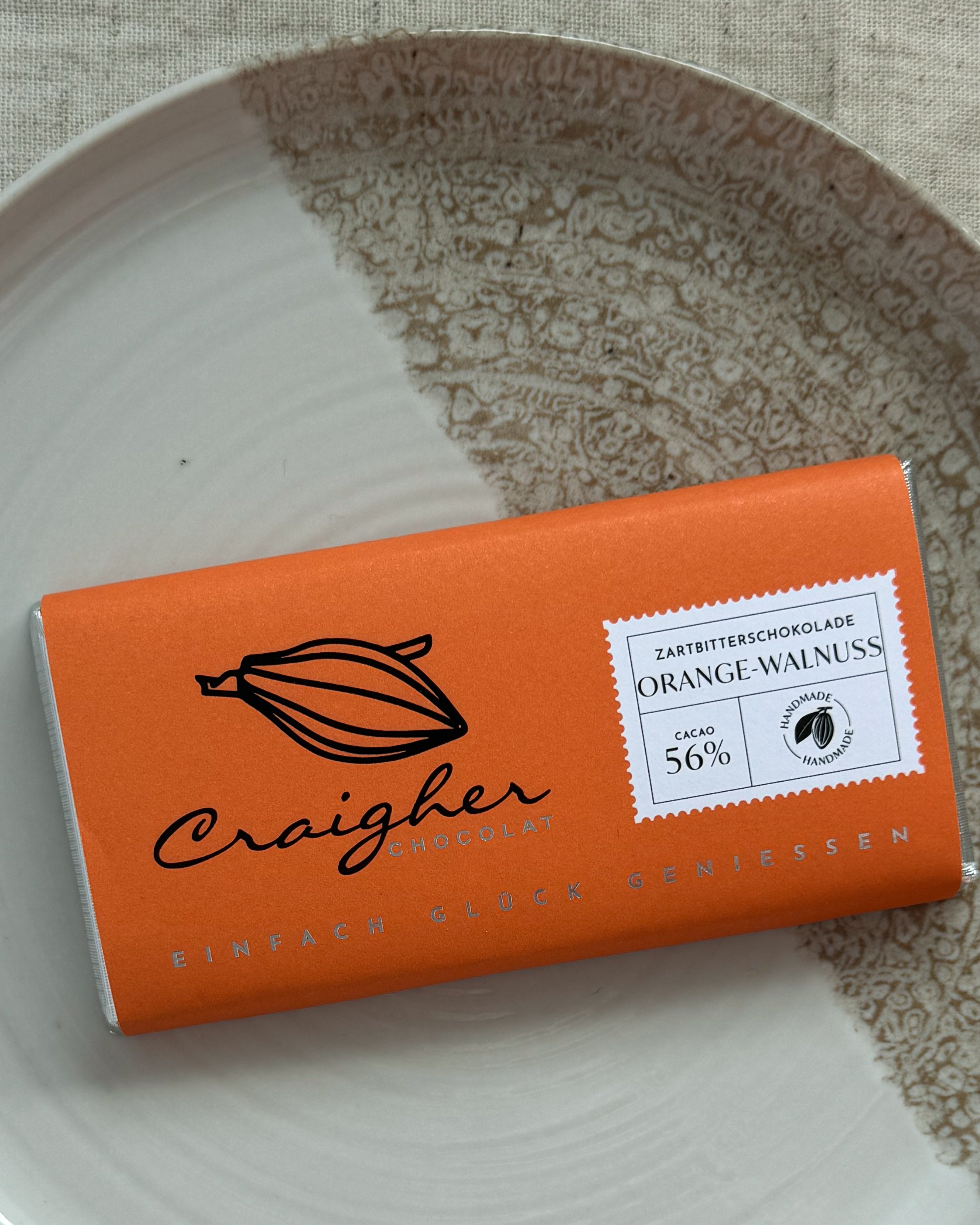 Zartbitter Schokolade | 56% | Orange-Walnusskrokant